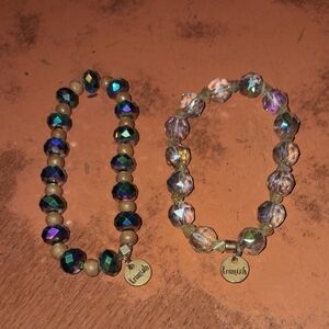 Two fancy sparkly Ermish sparkly braclets